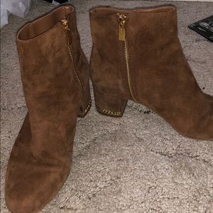 Brown and gold booties